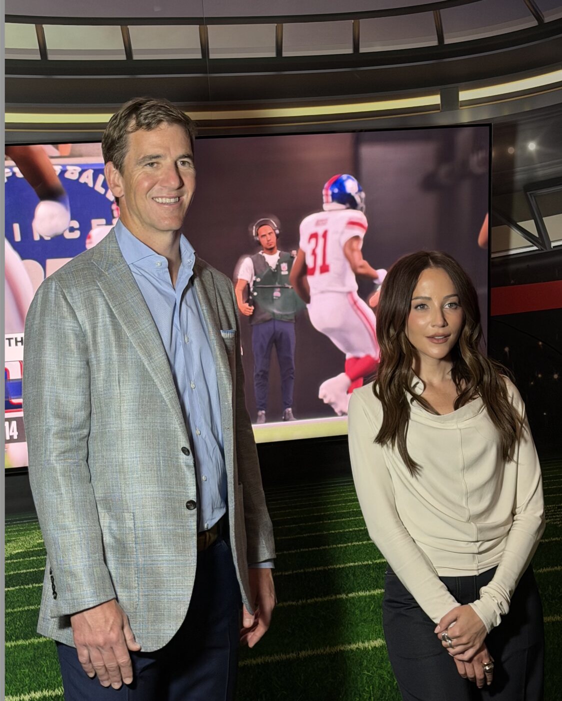 Eli Manning and Kay Adams at the TCL premium lineup launch in New York